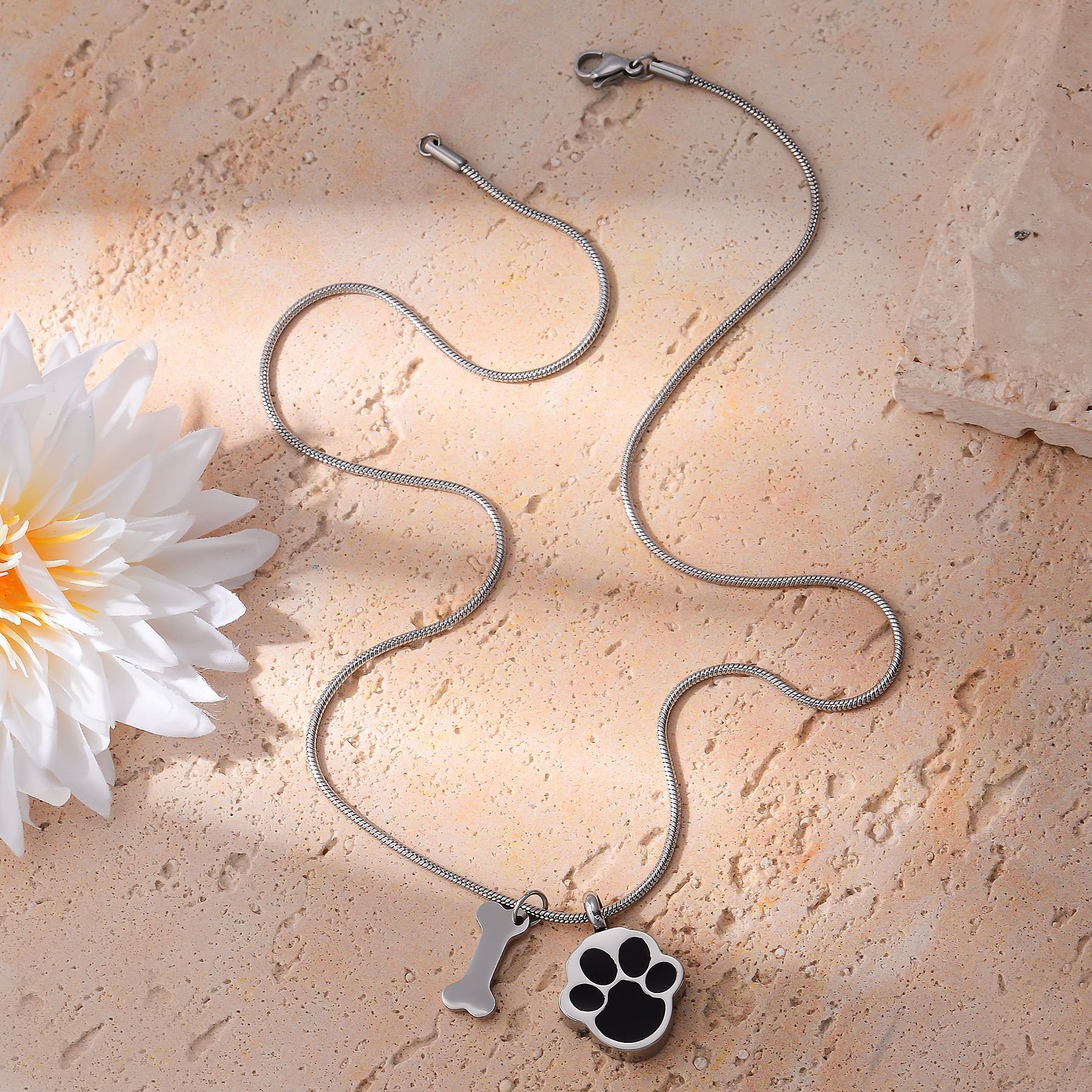 Cross-border bestseller stainless steel titanium steel necklace with paw print pendant, openable cremation urn keepsake, pet paw print necklace